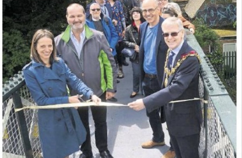 Cutting the ribbon on the restored footbridge