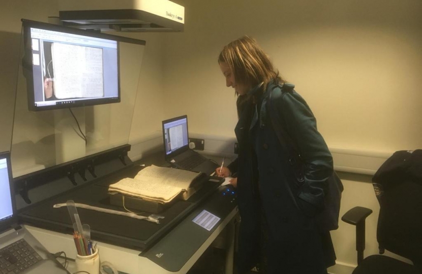 Helen looking at the Kent archives