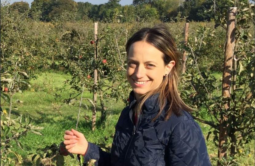 Helen visiting an orchard in Kent