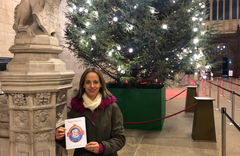 Helen with winning Christmas card