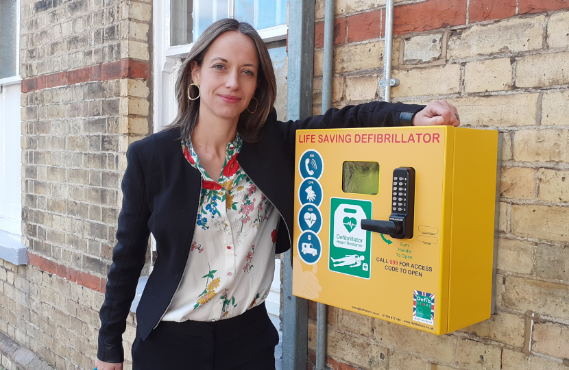 Helen with a newly installed defibrillator at Bearsted station