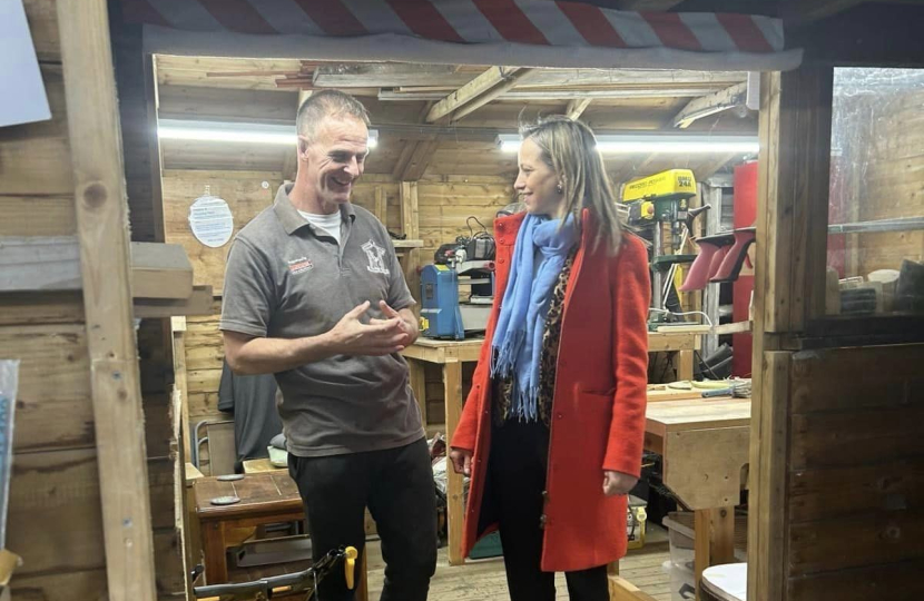 Helen Whately MP chatting at Faversham Men's Shed
