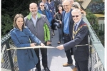 Cutting the ribbon on the restored footbridge