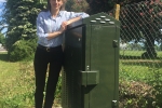 Helen at fibre broadband cabinet