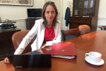 Helen at her desk in the Treasury