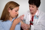 File photo: A girl being vaccinated