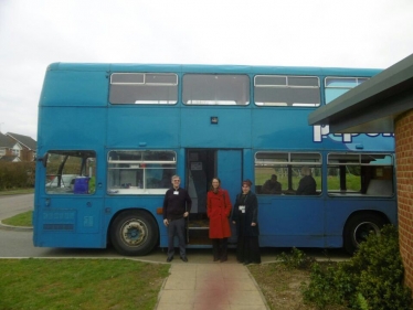 Helen holds an advice surgery on a bus with Amicus Horizon