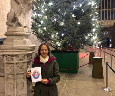 Helen with winning Christmas card