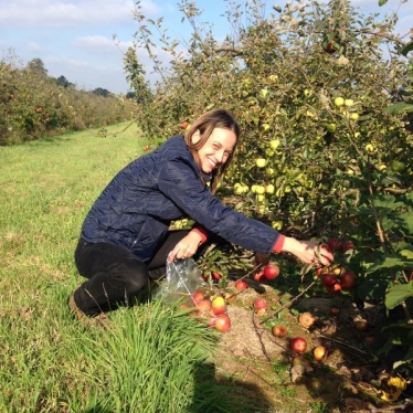 Helen Whately picking fruit