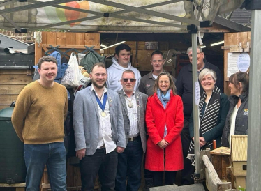 Helen Whately MP with volunteers at Faversham Men's Shed