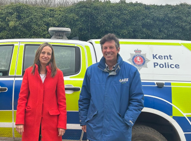 Helen and a local farmer speaking to Kent Police
